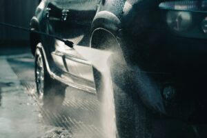 Dirty offroad car in a car wash